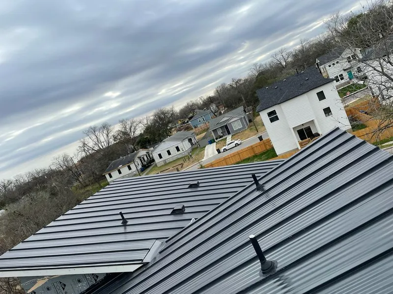 Standing seam metal roof panels with vents for Skylight Repair in The Meadows